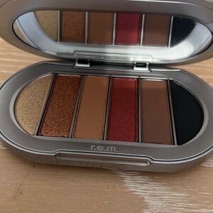 Brand new never use R. E. M, beauty, midnight shadows eyelet palette.